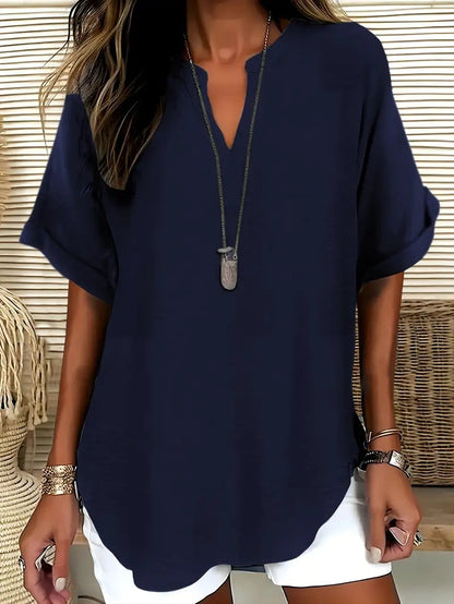 La Blouse Fluide à Col en V Évasé