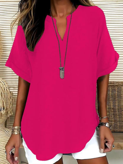 La Blouse Fluide à Col en V Évasé