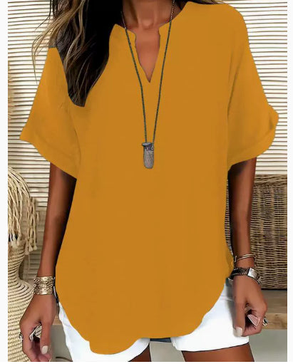 La Blouse Fluide à Col en V Évasé